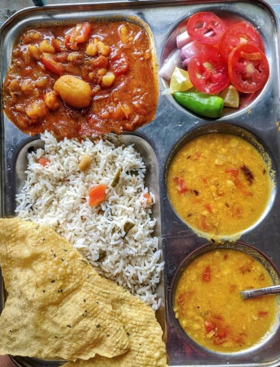 Daily meals — dal, rice, sabzi, salad, papad